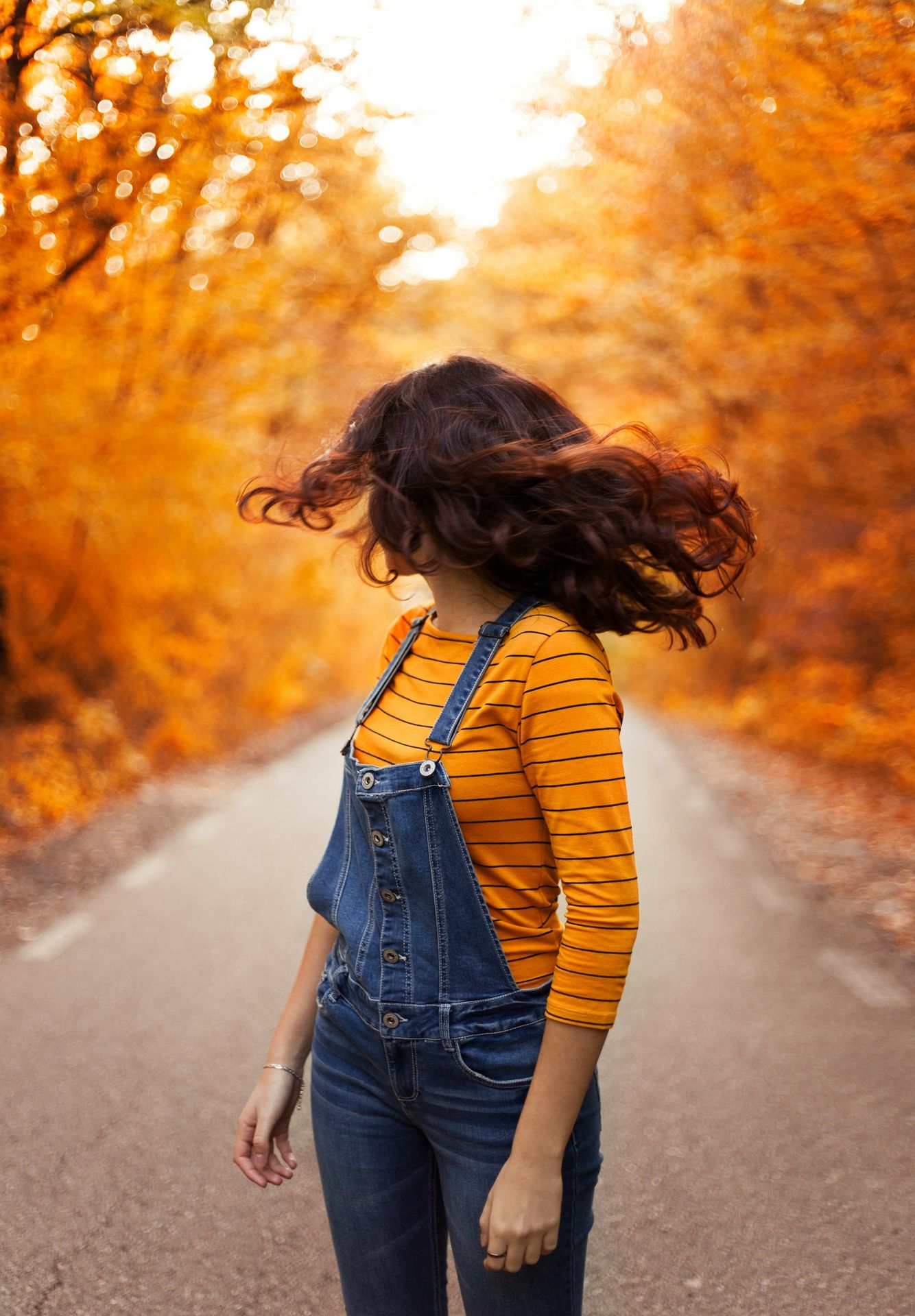 woman wearing blue overalls